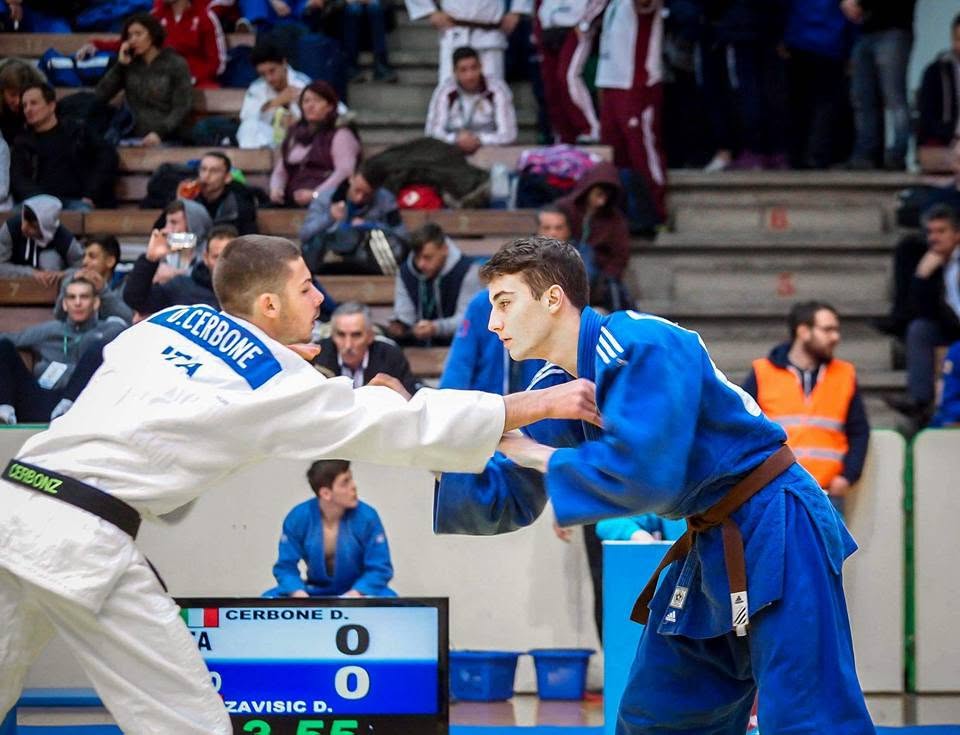 Dario Zavišić in a blue judogi during a judo bout.